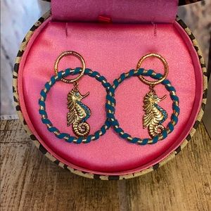 Betsey Johnson seahorse hoop earrings.